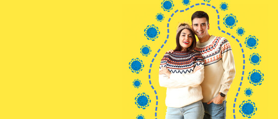 Happy young couple and drawn virus on yellow background with space for text. Concept of strong immunity - obrazy, fototapety, plakaty