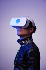 Man is using virtual reality headset. Concept of virtual, augmented and extended reality and metaverse.