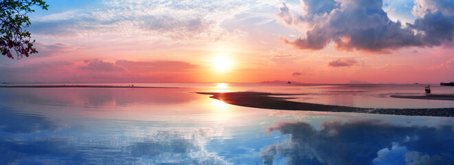 Beautiful sea sunset landscape, ocean sunrise, tropical island beach nature, soft pink sky clouds, sun reflection, blue calm water, dawn seascape, summer holidays vacation travel, Thailand, Koh Samui