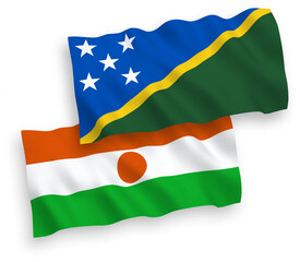 Flags of Republic of the Niger and Solomon Islands on a white background