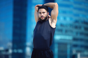 Man stretching for fitness training in city, running for cardio exercise and workout for strong body motivation. Commitment, healthy and sports runner or athlete ready for sport competition in Dubai