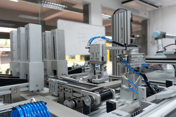 robotic arm catch for electronic assembly line. The robot for smart technology manufacturing...