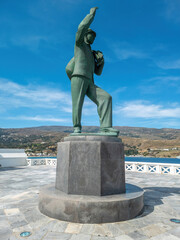 The Unknown Sailor Copper Statue In Andros island, Chora town, Cyclades, Greece. Vertical