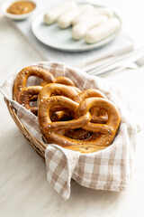 Baked bavarian pretzels on kitchen table.