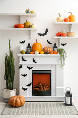 Interior of living room decorated for Halloween with fireplace and shelves