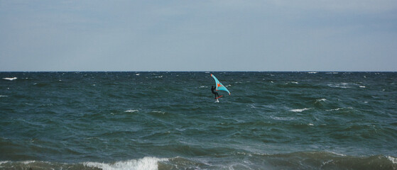 Person with a wing kite at K gn s island in Denmark