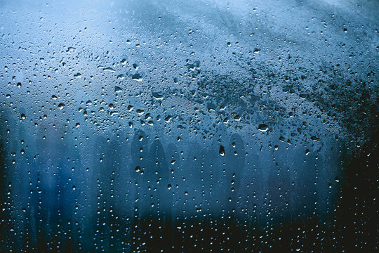 Abstract background. Blur Rain drops on the window.