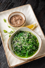 delicious chuka seaweed with nut sauce and lemon