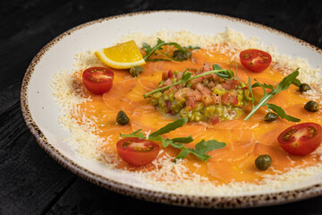 delicious salmon carpaccio on a plate