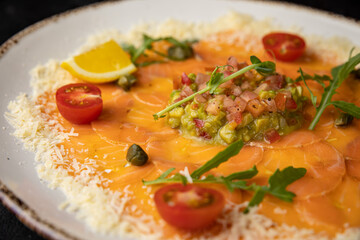 delicious salmon carpaccio on a plate