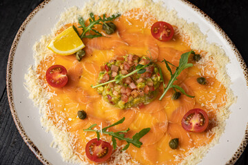delicious salmon carpaccio on a plate