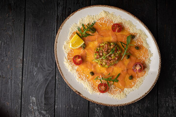 delicious salmon carpaccio on a plate