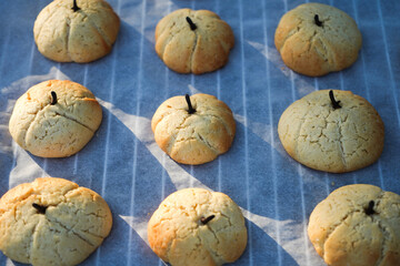 Funny food for halloween. Homemade cookies in shape of pumpkin                                  