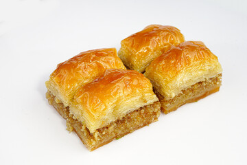 Baklava with walnuts, white background