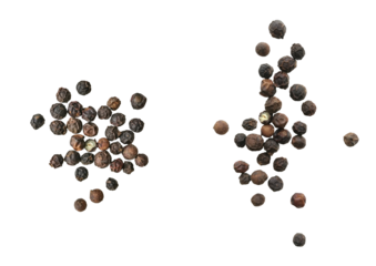 Black pepper on a white background. The view from top.