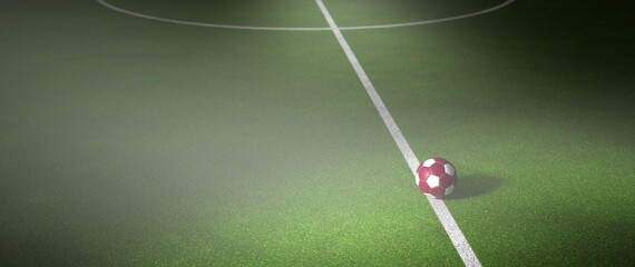 Fußball in katarischen Farben auf einem Fußballfeld