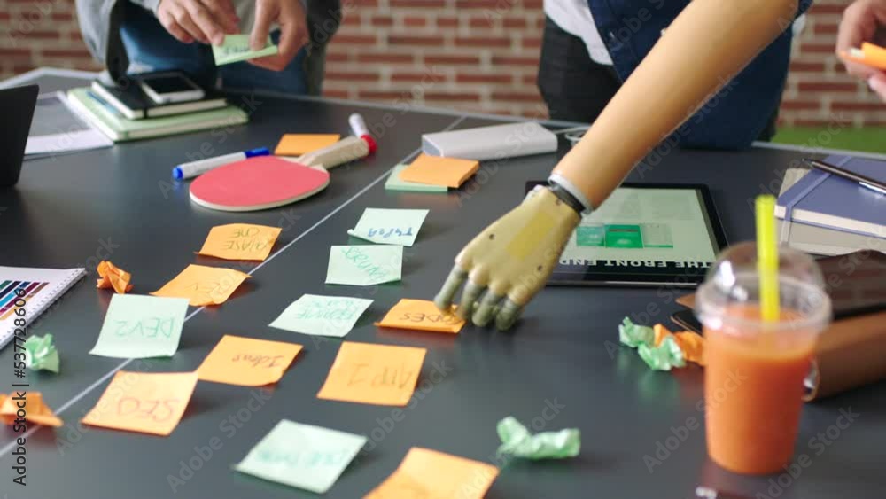 Poster hands, brainstorming and planning group project with sticky notes, digital device or talk in office.