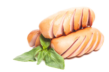 grilled sausages with green basil leaves isolated on white background