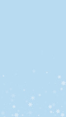 Falling snowflakes christmas background. Subtle flying snow flakes and stars on light blue winter backdrop. Beautifully falling snowflakes overlay. Vertical vector illustration.