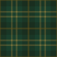 Green and yellow tartan plaid. Scottish pattern fabric swatch close-up. 