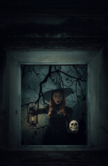 Obraz na płótnie Canvas Halloween witch holding ancient lamp and skull standing in old damaged wood window with wall over cross, church, birds, dead tree and spooky cloudy sky, Halloween mystery concept