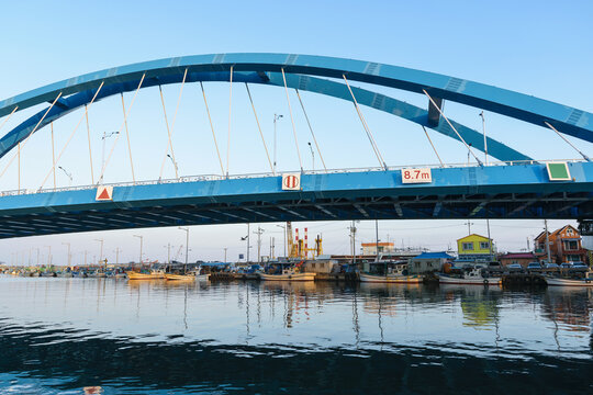 Bridge Over River At Fishing Village In Korea.