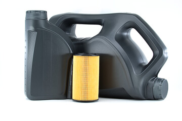 Car oil filter and motor oil containers over a white