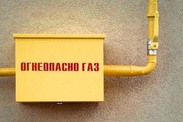 Russian gas box, arm and pipe and text Flammable Gas Made in Russia