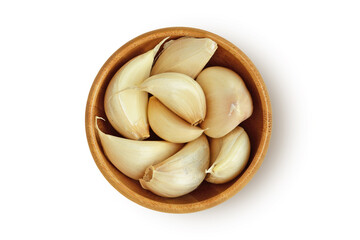 Fresh garlic cloves in wooden bowl on white background