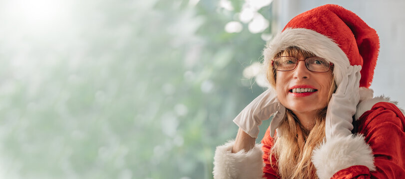 Middle Aged Adult Woman Wearing Santa Claus Costume