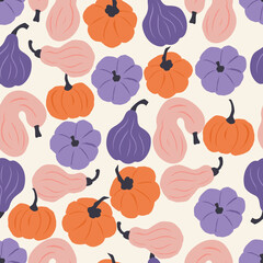 Seamless pattern of colorful hand drawn pumpkins on light background. Creative prints surface design. Playful graphic flat illustration for seasonal fall, autumn and Halloween holiday and celebration.