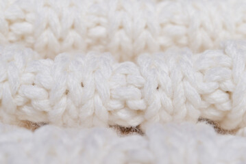 White knitted texture of woolen wool	