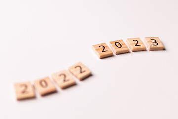 2022 to 2023 text on wooden blocks with copy space for concept background. Resolution, plan,...