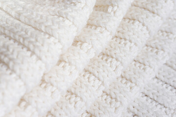 White knitted texture of woolen wool	