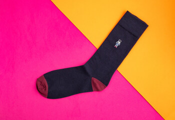 Dark blue astronaut sock - Fuchsia and orange background