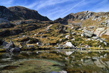 Fototapeta na wymiar Lake Pasci or Lake of Mombarone, located on the path that climbs to the top of Mombarone