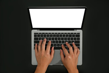 Above view woman man hands typing on laptop computer isolated in black background