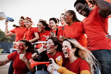 Crowd football fans having fun supporting favorite team - Soccer sport entertainment concept