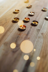 A lamp is glowing on dark background. Lamp