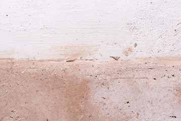 Separación dos texturas pared, tonos rosados y blancos, casa rústica, textura aspera