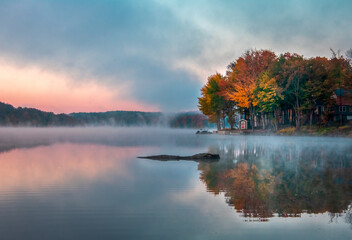 Naklejka na ściany i meble Autumn Sunrise Reflection Over the Lake