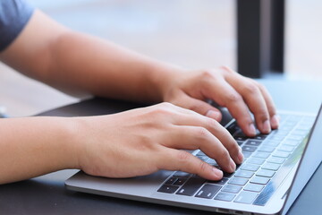 Cardholder male hands holding credit card online payment via e-bank. Male consumer pays for purchases in web stores using laptop technology. Online Shopping Concept. Dolly shot