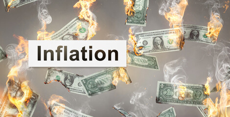Inflation concept with burning Dollar bills