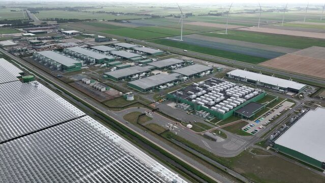 Datacenter building complex computing center in Hollands Kroon. Data technology ICT equipment building housing like servers. Building facility communication tech.