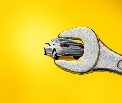 collage, gray car in wrench isolated on yellow background