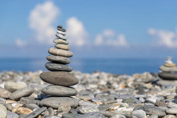 Pebble stone over the blue sea