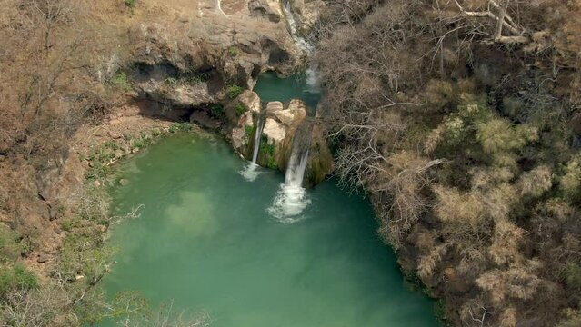 Waterfalls At Cascada de Comala Park, Nature Preserve In Chiquilistlan, Mexico. - aerial zoom in