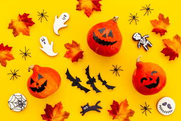 Halloween pumpkin heads and funny cookies. Halloween holiday background