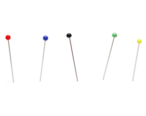 Needle Pins on White Background