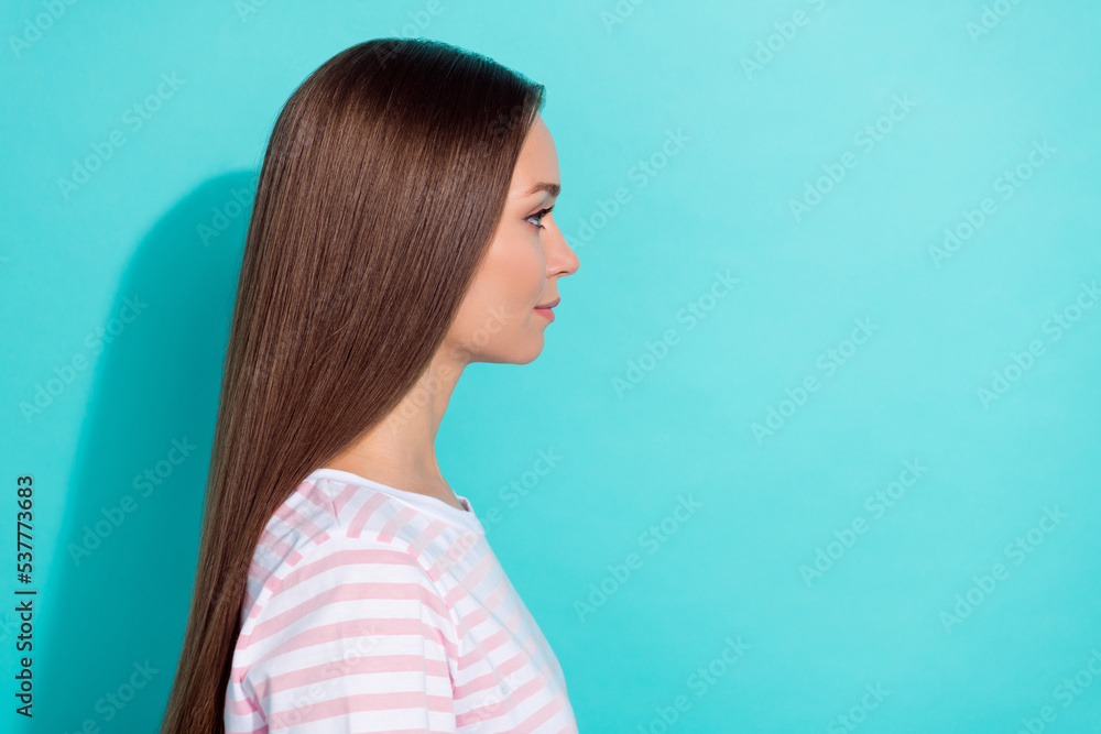 Wall mural side profile photo of nice adorable girl with long hairstyle wear striped t-shirt look empty space i - Wall murals